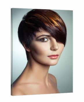 Fashion portrait of a beautiful girl with colored dyed hair, professional short hair coloring. studio shot.