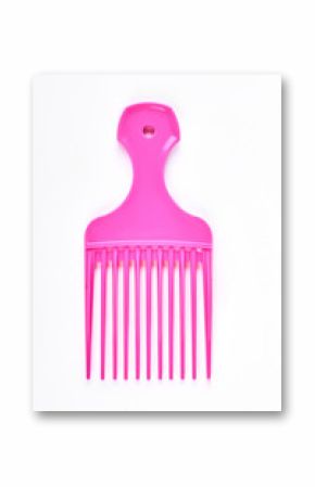 Pink professional afro comb. Hairdresser vivid color afro comb isolated on white background.