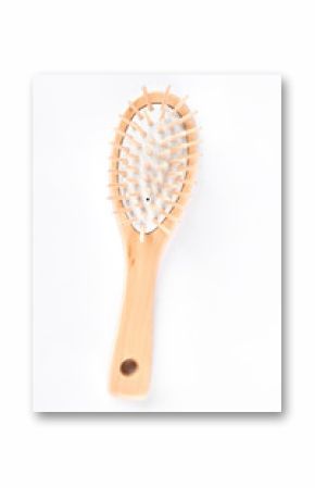 Wooden anti static hair brush. Natural cushion hair brush isolated on white background, top view. Massage hair brush.