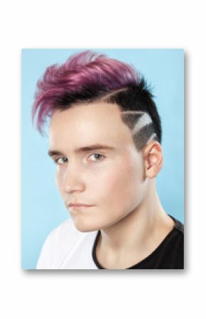 Portrait of a beautiful young teenager with a beautiful creative hairstyle, hair painted in pink.
