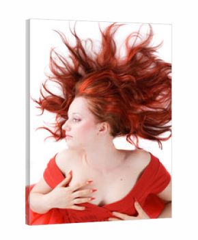 The girl lays on a floor.