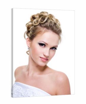 Attractive young woman with beautiful wedding hairstyle