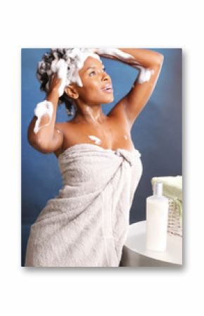 Cute African American using shampoo