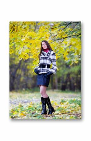 Beautiful girl with long hair walking in a park