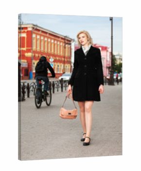 Young woman walking on the street