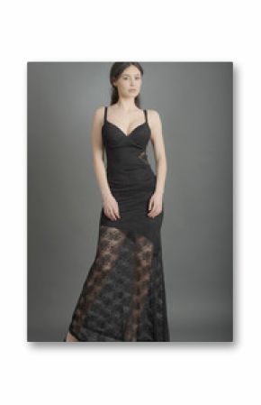 beautiful woman in elegant dress posing in studio