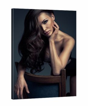 Vogue style photo of very delicate brunette woman