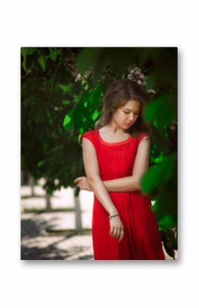 Portrait of a beautiful sexy fashion girl in a red dress 
