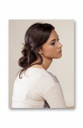 young woman with a loosely clenched hair