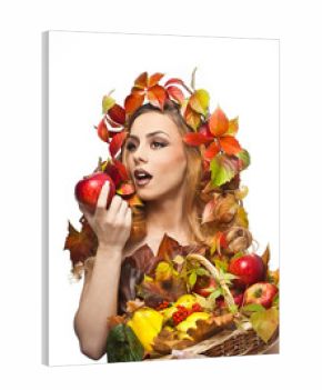 Autumnal woman. Beautiful creative makeup and hair style in fall