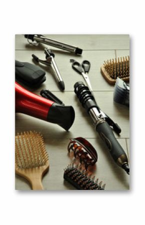 hairdressing tools on a wooden floor