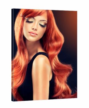 Beautiful model girl  with long red curly hair . Hairstyle and  cosmetics