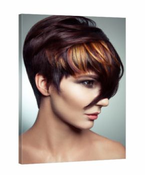 Fashion portrait of a beautiful girl with colored dyed hair, professional short hair coloring. studio shot.