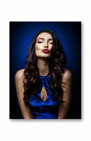 Studio portrait of charming brunette