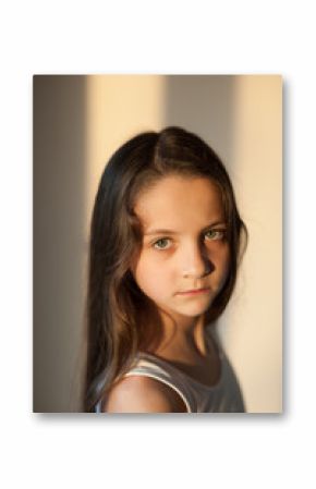 Portrait of handsome young girl looking into the camera