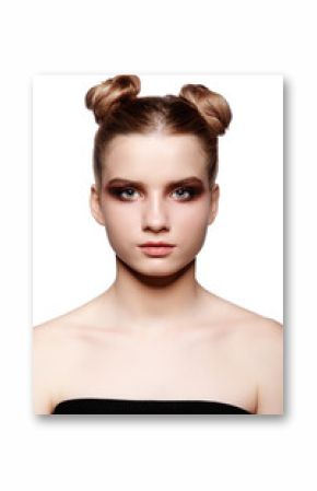 Young teen female beauty portrait with day makeup  and bun hair style on white background