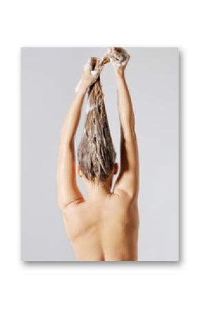 Woman washing her blond hair