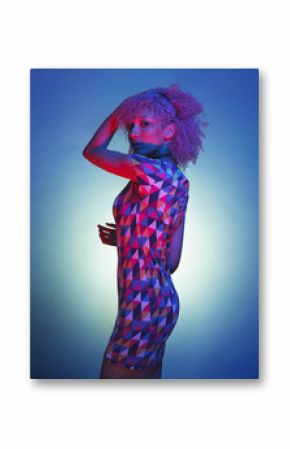 african american woman with groovy afro hair dancing isolated on a blue background