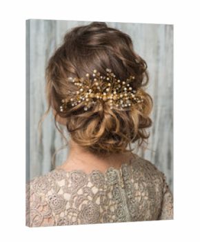 Hairstyle decorated by shiny gold hair accessory