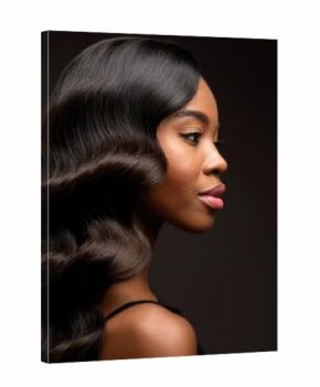 Beautiful woman in profile with long and shiny wavy hair . Beauty model girl with curly hairstyle