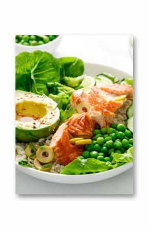 Salmon avocado bowl with broccoli, green peas, rice and fresh salad. Healthy food, top view