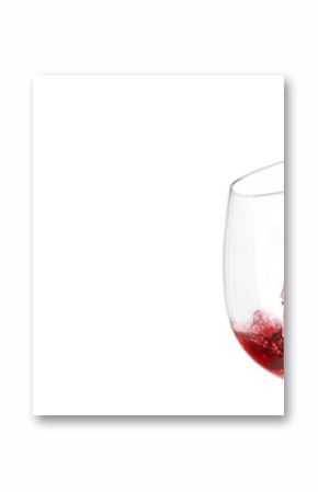 A close-up of red wine being poured into a glass, isolated on a white background. The splash and flow of the liquid capture a dynamic moment.