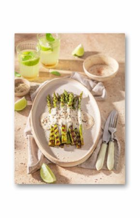 Fresh grilled asparagus with sesame and lime.