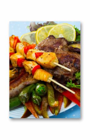 Plate of dish bulgarian cuisine meshana scara with different grilled meat and vegetables