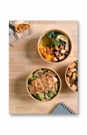 Having a lunch break at the office with delicious Healthy food delivery in take away boxes, Healthy eating concept.