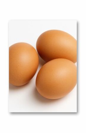 Three eggs displayed on a plain white surface