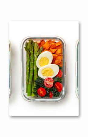 Healthy meal prep ideas, containers, lunchboxes with variety of high protein trendy food, salmon quinoa and avocado, eggs asparagus, kale, sweet potato, chicken, barley and zucchini. White background.
