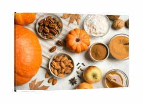 Autumn fall baking background with pumpkins, apples and ingredients