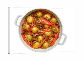 Delicious roasted potatoes with red peppers and bacon cooked in a cozy kitchen