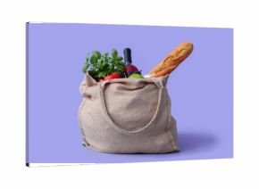 Eco bag with different groceries on lilac background