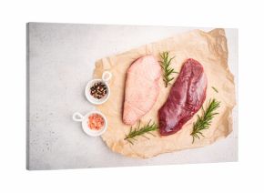 Preparation for cooking raw duck breast with ingredients on white background, top view. Space for text. High quality photo