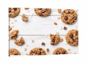 Healthy gluten-free oatmeal cookies on a white wooden surface, flat lay with space for text