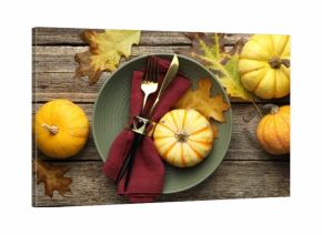Beautiful table setting with autumn decor on wooden background, flat lay