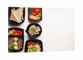 Be healthy. Healthy food delivery in black boxes to go on white background with copy space for advertisement