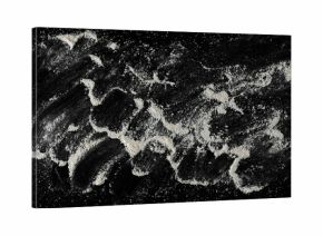 Pile of integral barley flour isolated on black background, top view 