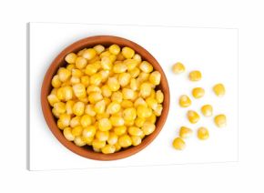 corn seeds in ceramic bowl isolated on white background. Top view. Flat lay