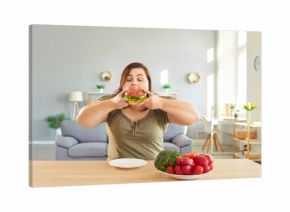 Obese hungry woman with excessive fat eating unhealthy fast food instead vegetables plate, tasty hamburger, juicy burger, cheeseburger, chubby overweight plus size big fat fit lady with good appetite