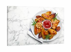 Delicious grilled chicken wings served on white marble table, top view. Space for text