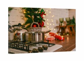 Christmas kitchen scene with festive decorations and cooking utensils
