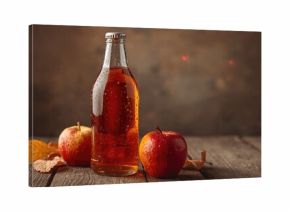 Close-up of apple cider on vintage wooden table, textured glass and natural setting, Earth Day