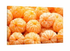 Many ripe peeled tangerines as background, closeup