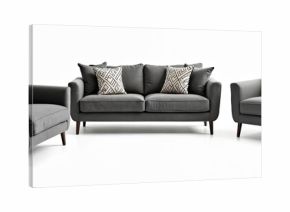 Gray upholstered sofa and armchairs with geometric patterned pillows. Modern furniture set stands on dark wood legs against a white background. Cozy living room ensemble ready for use.