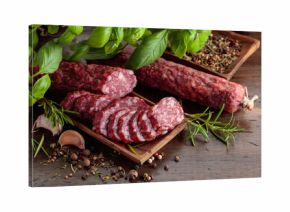 Sliced smoked sausage with herbs and spices.