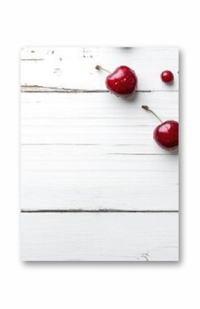 organic cherries on a white wooden table background