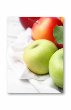 Different whole ripe apples on white wooden table, closeup. Space for text