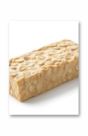 Block of fresh tempeh isolated against a white background